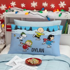 Funda de almohada de peluche con los amigos patinadores de PEANUTS®