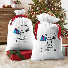 Bolsa de regalo extragrande de PEANUTS® Snoopy tiene un regalo