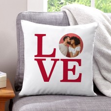 Almohada decorativa con el mensaje "Amor"
