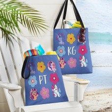Bolso de mano azul con diseño de arcoíris y flores de My Little Pony.