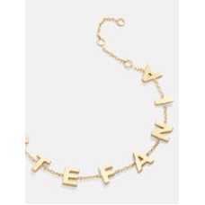 Pulsera con nombre personalizado en oro de 18 quilates con letras espaciadas