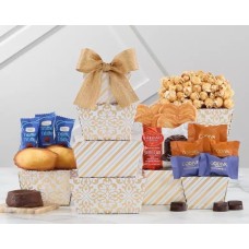 Torre de regalos de brownies, pasteles y dulces