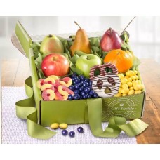 Caja de frutas y dulces de primavera