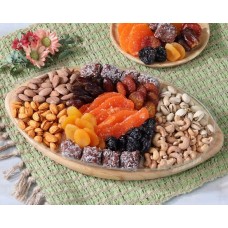 Tabla de cortar de bambú con forma de balón de fútbol, ideal para frutas secas y frutos secos.