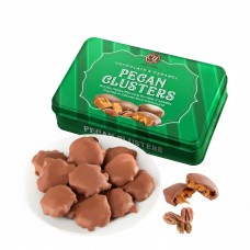 Racimos de nueces con caramelo de chocolate en lata de regalo