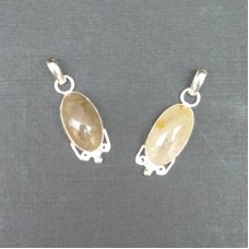 Colgante de plata de ley con cristal de cuarzo rutilado, elaborado por un artista.