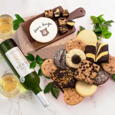 Cesta de regalo reconfortante de panadería con vino blanco "Calidez y bienestar"