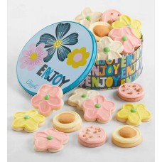 Disfruta de la lata de regalo con galletas glaseadas con crema de mantequilla.