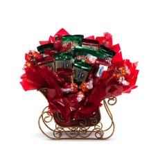 Ramo de dulces navideños con forma de trineo (tamaño regular)
