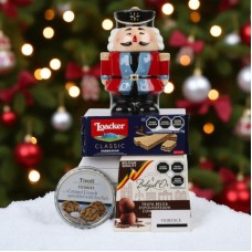 Tarro de cerámica con forma de cascanueces, con galletas y trufas.