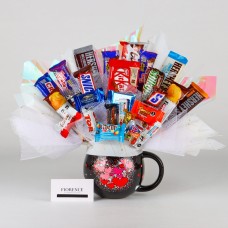 Taza gigante Disney con bombones y ramo de caramelos