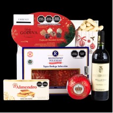 Caja Deluxe con vino tinto español, embutidos, chocolates, galletas y mucho más