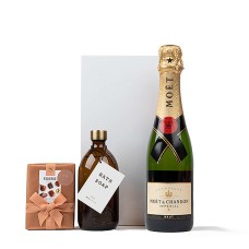 Champán Moet, jabón de baño Wellmark y chocolates Neuhaus