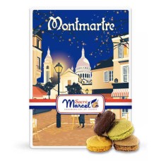 Caja metálica decorada con imágenes de Montmartre de París y rellena de galletas macaron.