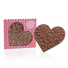 Corazón de Venchi bañado en chocolate con leche y avellanas del Piamonte.