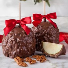 Manzanas de caramelo con chocolate y nueces pecanas