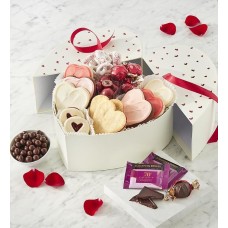 Caja de regalo con forma de corazón llena de dulces