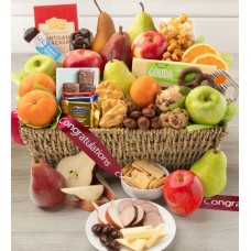 ¡Felicidades! Cesta de regalo grande de frutas y dulces.