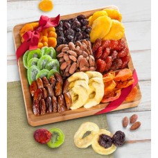 Bandeja con mango de bambú natural con frutas y frutos secos.