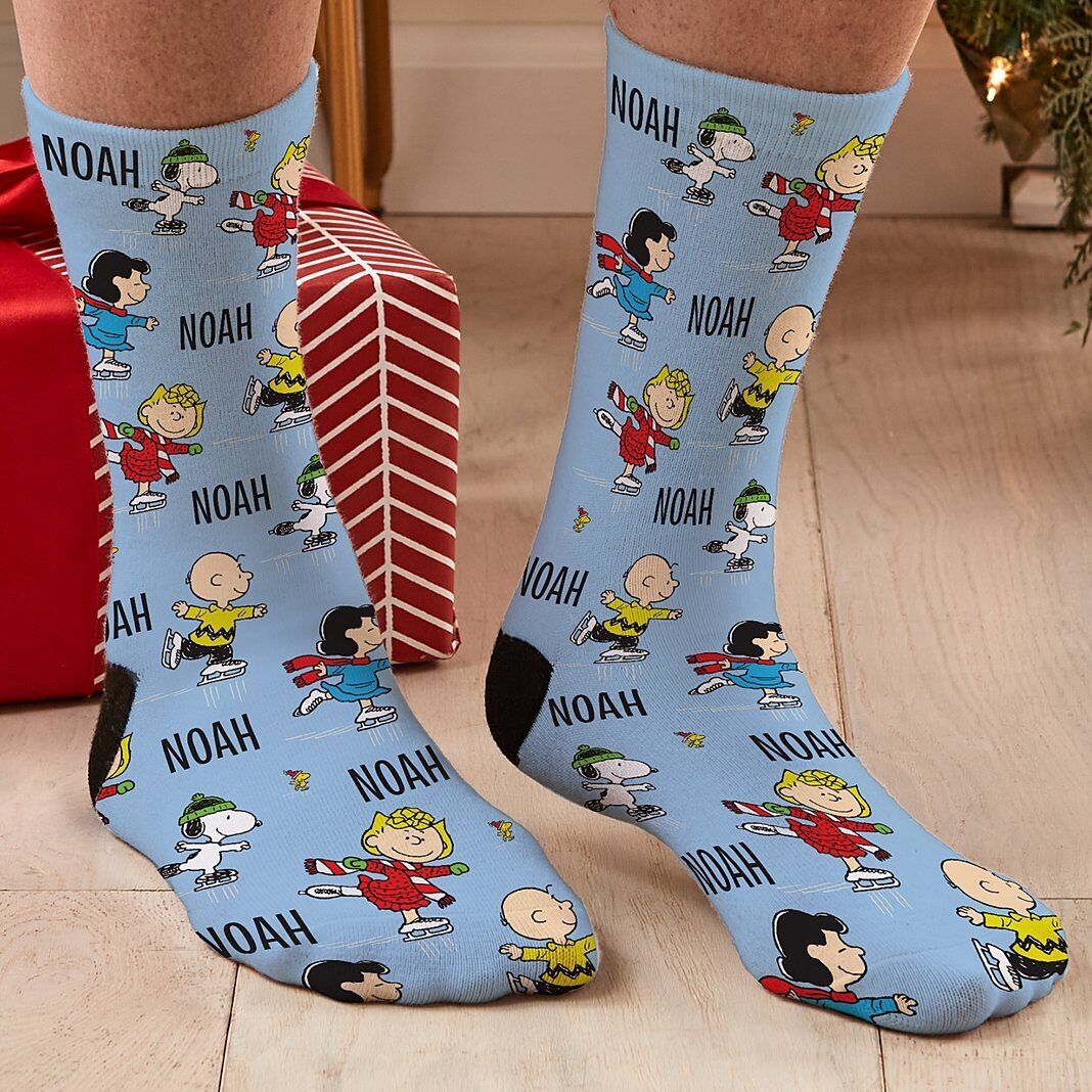 Calcetines de PEANUTS® con temática de patinaje sobre hielo