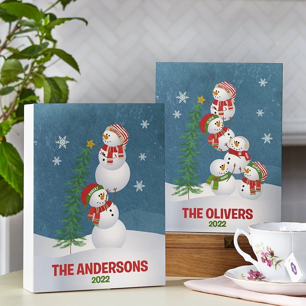 Muñecos de nieve adorables de madera
