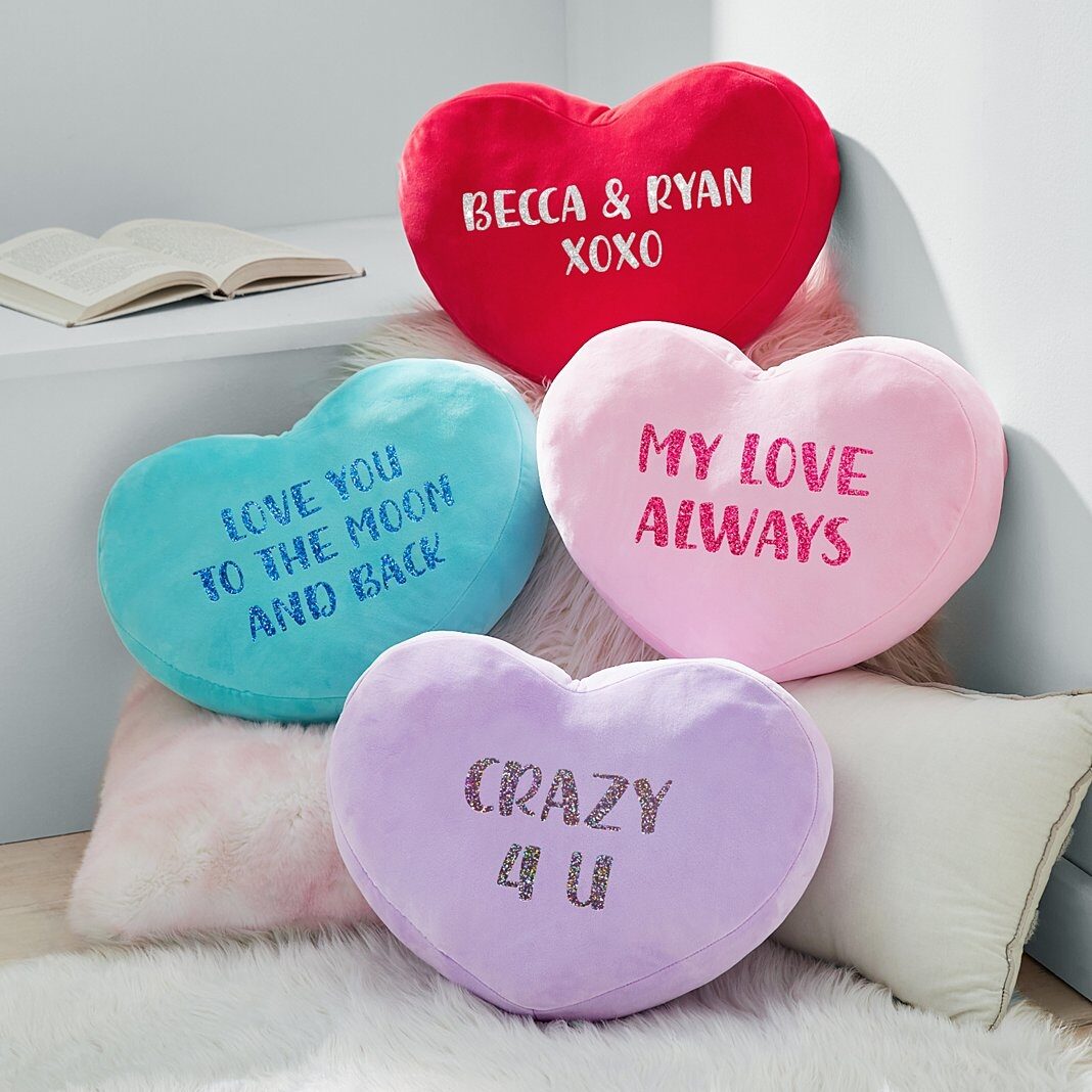 Almohada de peluche con mensaje brillante en forma de corazón