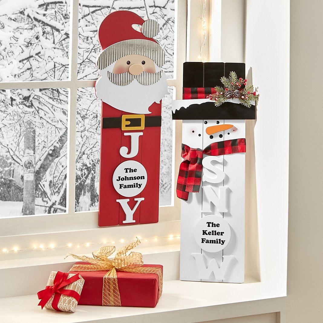 Arte de pared de madera con muñeco de nieve y Papá Noel rústico