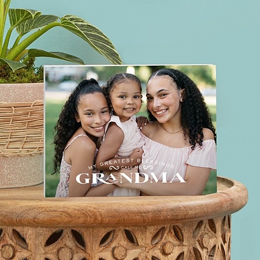 Bloque de madera con foto de las mayores bendiciones
