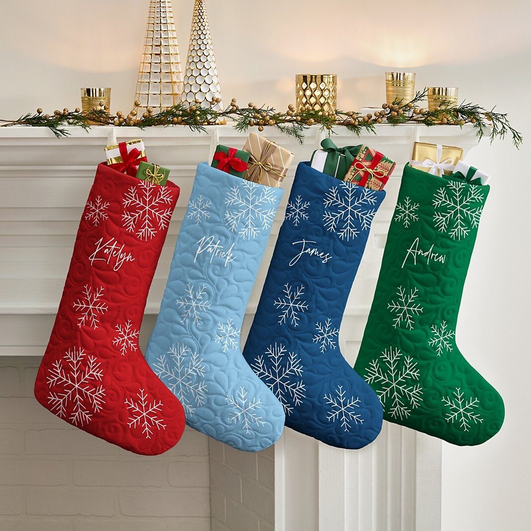 Nueva media acolchada con copos de nieve