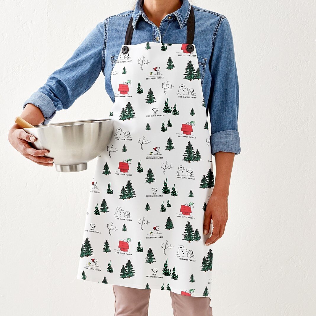 Nuevo delantal con estampado integral de Snoopy de invierno de PEANUTS