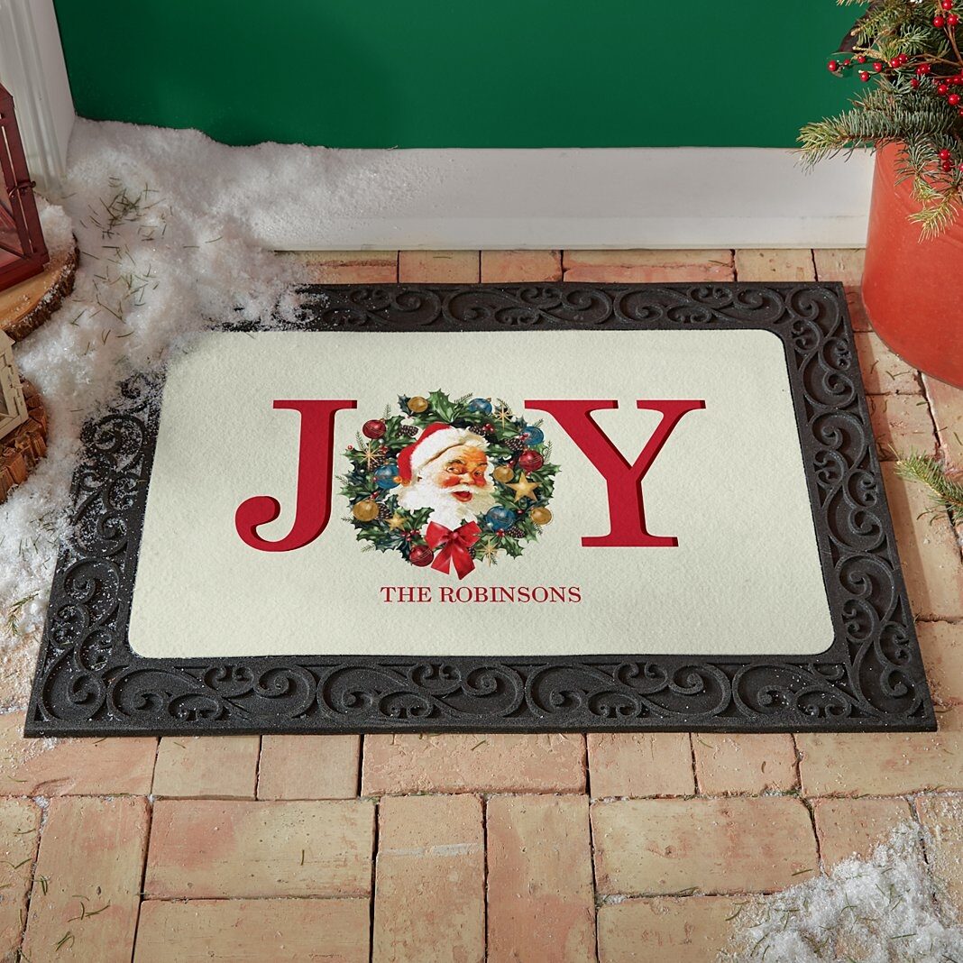 Nuevo felpudo con corona de Papá Noel