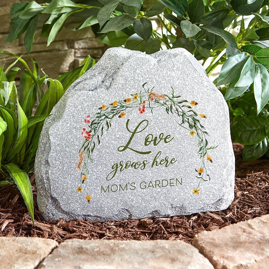 El amor crece aquí Piedra del jardín en pie