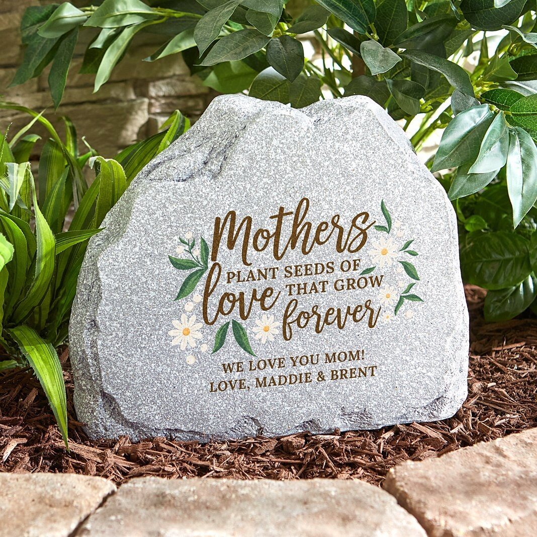 Piedra de jardín con semillas de amor