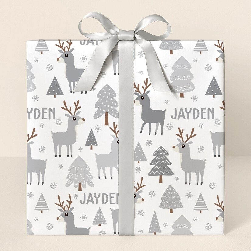 Papel de regalo con renos de invierno