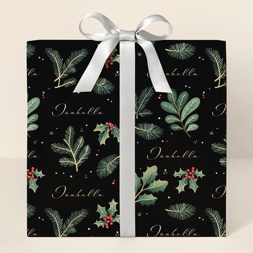Papel de regalo con diseño de acebo de invierno
