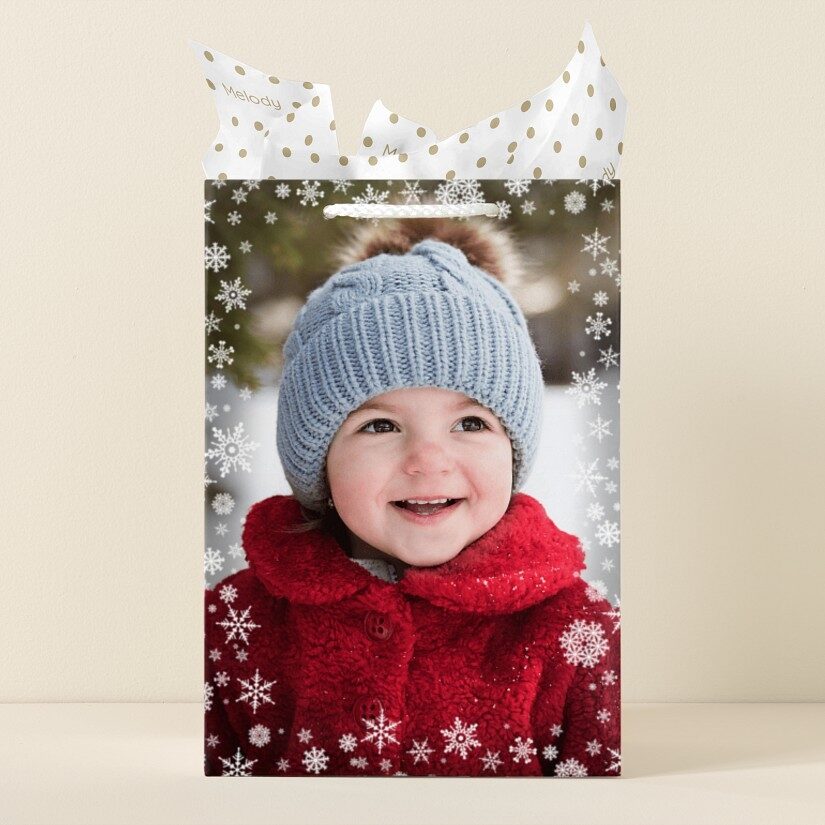 Bolsa de regalo fotográfica con borde de copos de nieve