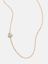 Collar asimétrico con forma de corazón en oro de 18 quilates