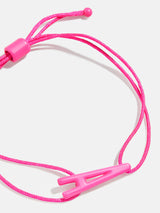 Pulsera de cordón con inicial de este a oeste