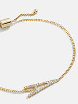 Pulsera con inicial Este-Oeste