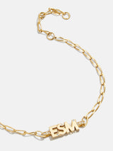 Pulsera personalizada con inicial en oro de 18 quilates