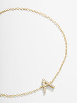 Pulsera con inicial de oro de 14 quilates y diamantes