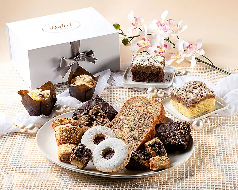 Colección de pasteles, muffins y rugelachs más dulces