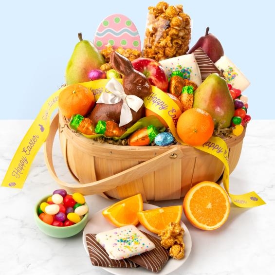 Cesta de regalo de frutas y golosinas de conejito de Pascua