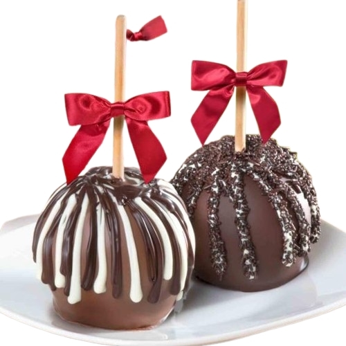 Las manzanas de caramelo cubiertas de chocolate negro y leche se combinan en una caja de regalo de madera