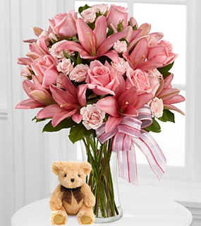 Pink Paradise (12 Rosas + 3 Lirios + Teddy Bearus)