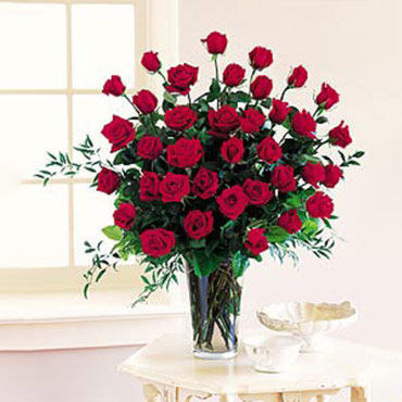 Encanto (24 rosas en un florero)