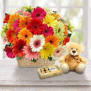 Flores de abrazo (10 gerberas + oso de peluche + chocolates)