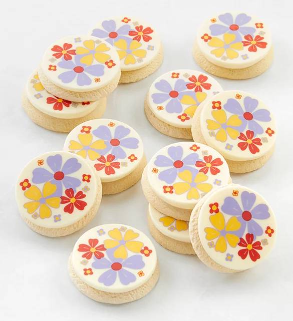 Caja de regalo de galletas decoradas con flores y glaseado de crema de mantequilla