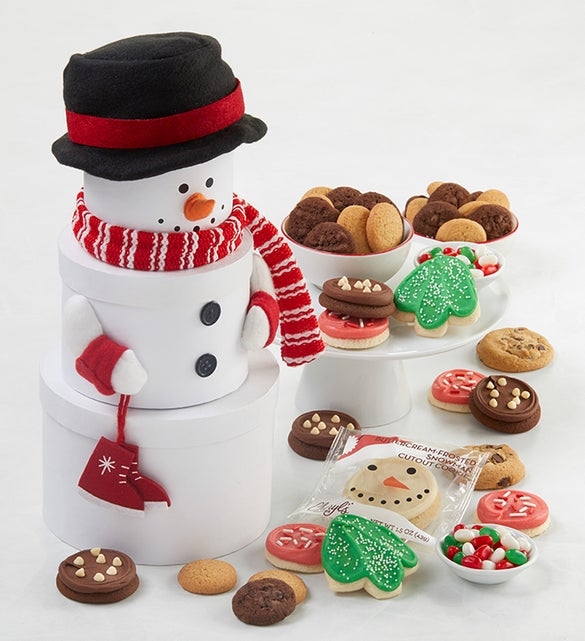 Torre de regalos de muñecos de nieve patinadores