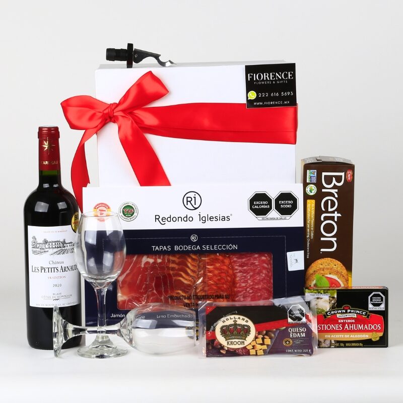 Caja de regalo gourmet con vino tinto francés y más.